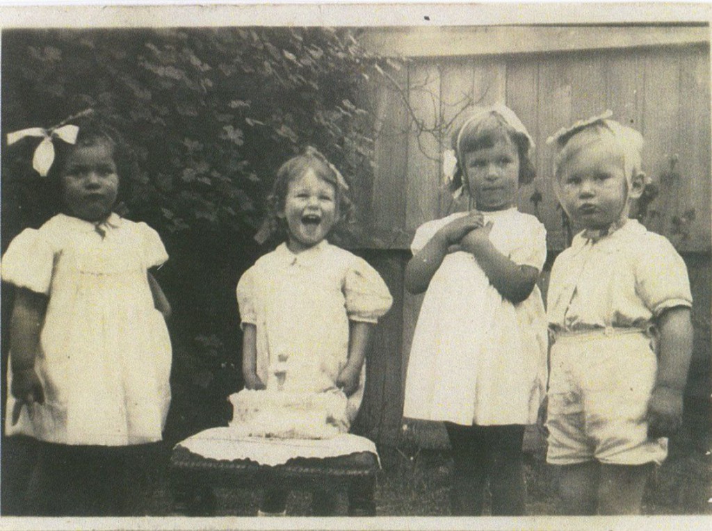 At Christine Kennedy's 2nd birthday party. Left to right: Jeanette, Christine, Barbara and Grant.