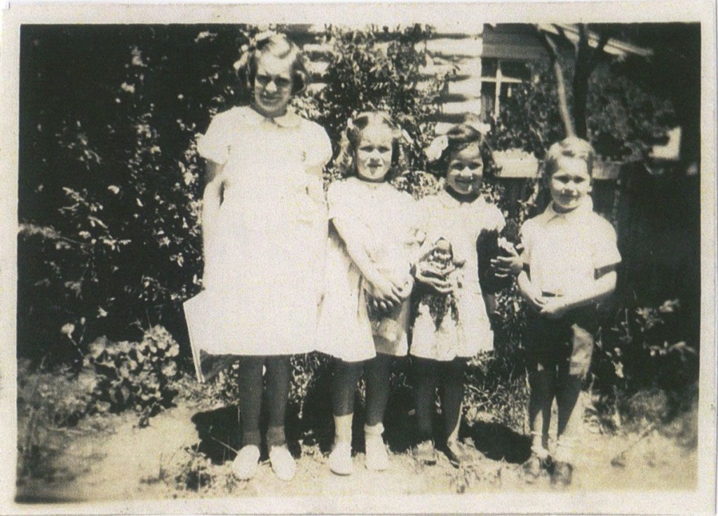 Xmas Day line up with gifts. Left to right: Little Ivy, Barbara, Jeanette and Grant.